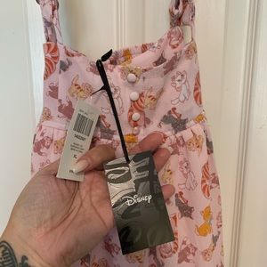 2 SUPER cute Disney overall skirts (Winnie the Pooh & Cats of Disney)